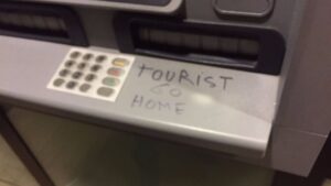Cajero Tourist Go Home