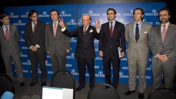Los hermanos, con su padre ya fallecido