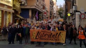 Lema en la cabecera de la manifestaci&oacute;n