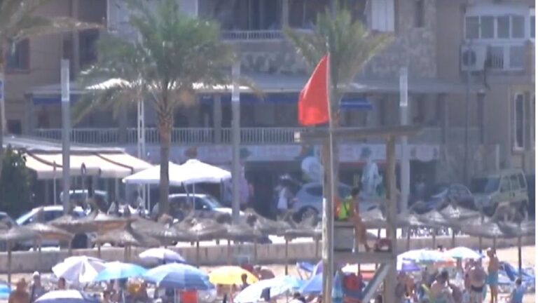 bandera roja ciutat jardí