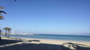 buen tiempo sol calor playa arenal