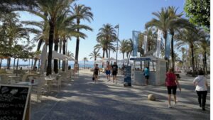 sol playa arenal turistas