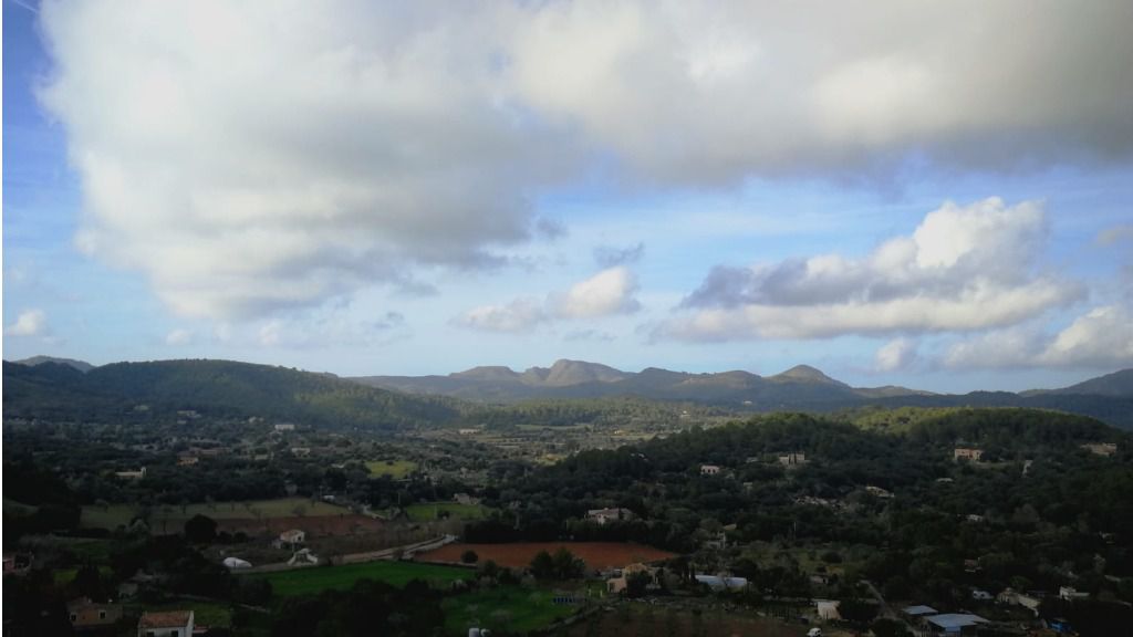 Arta murallas nubes