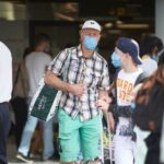 turistas aeropuerto mascarillas