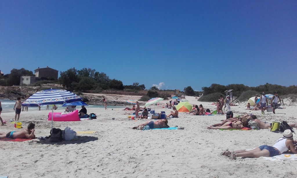playa turistas calor