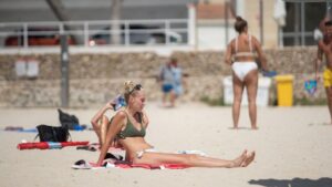 Turistas brit&aacute;nicos playa