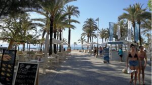 sol playa arenal turistas