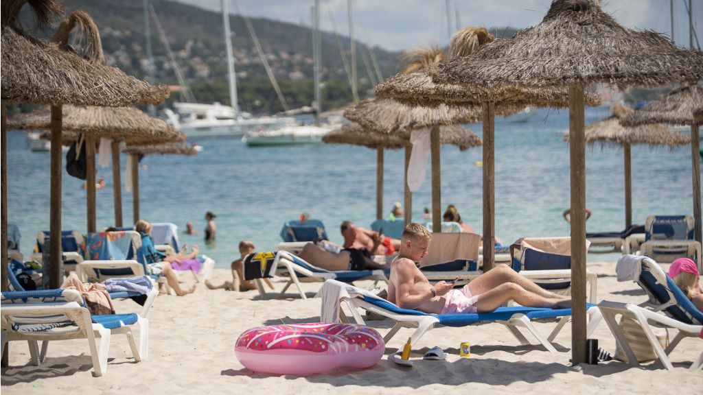 turistas británicos playa