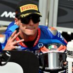 Izan Guevara celebrando su primer podio en Moto2 en Indonesia