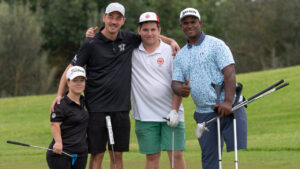 Cuatro golfistas posando en el campo durante el Handisport Mallorca Open 2025