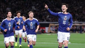 Jugadores de Japón celebrando un gol durante un partido de fútbol