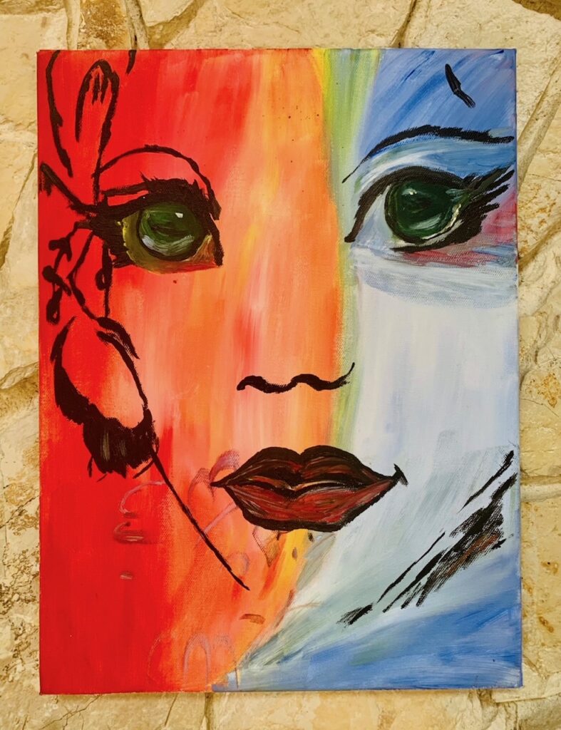 Pintura abstracta de un rostro con colores vibrantes