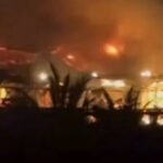 Incendio en un club nocturno en Goa, India, con llamas y humo.