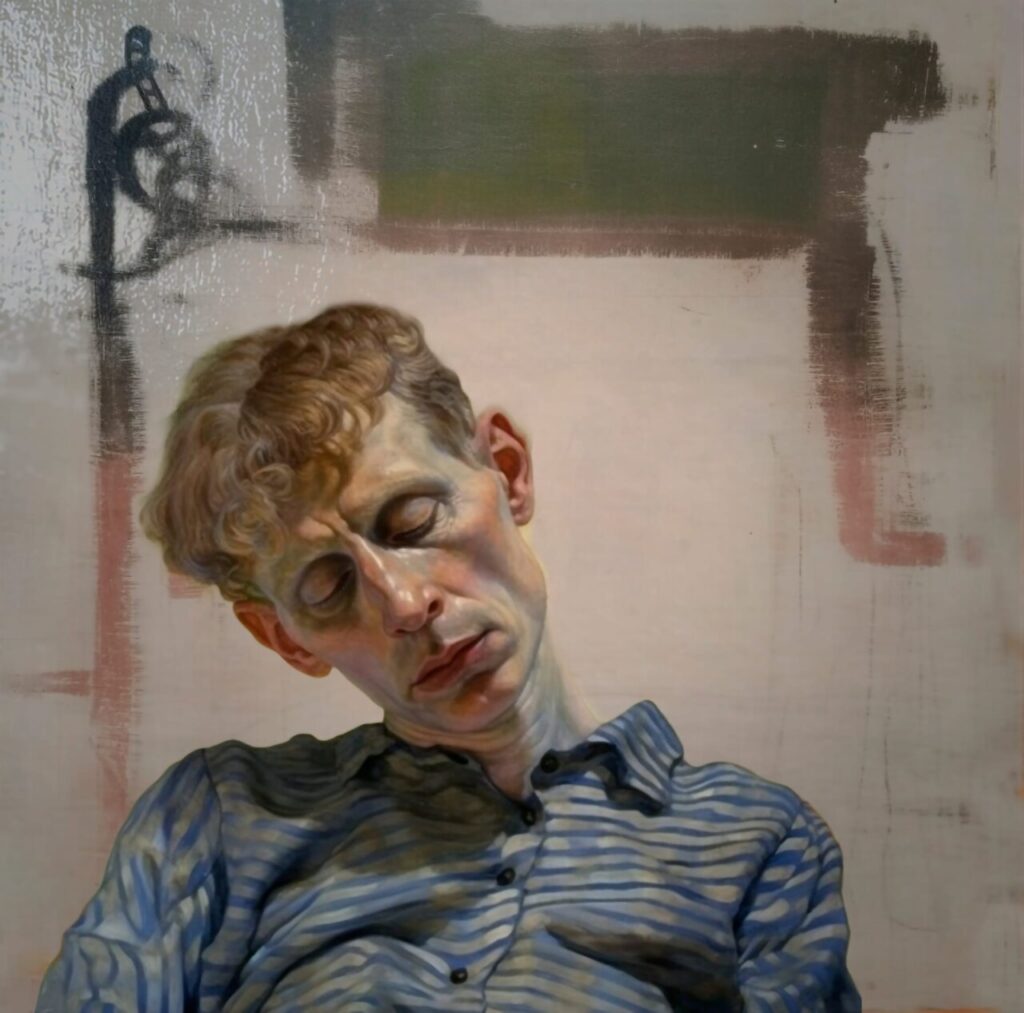 Retrato de un hombre con cabello rizado y camisa de rayas