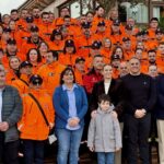Grupo de voluntarios de Protecci&oacute;n Civil en un homenaje en Baleares