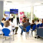 Concierto en Cl&iacute;nica Juaneda con cuarteto de cuerda y p&uacute;blico presente.
