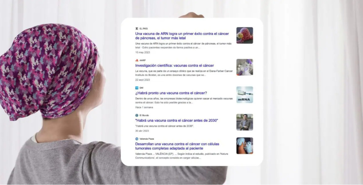 Persona con pa&ntilde;uelo en la cabeza mirando titulares sobre c&aacute;ncer
