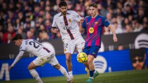 Jugadores del FC Barcelona y RCD Mallorca en un partido de f&uacute;tbol