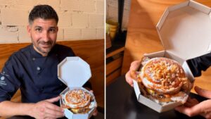 Chef mostrando la hamburguesa La Estrella de Raimundo en una caja