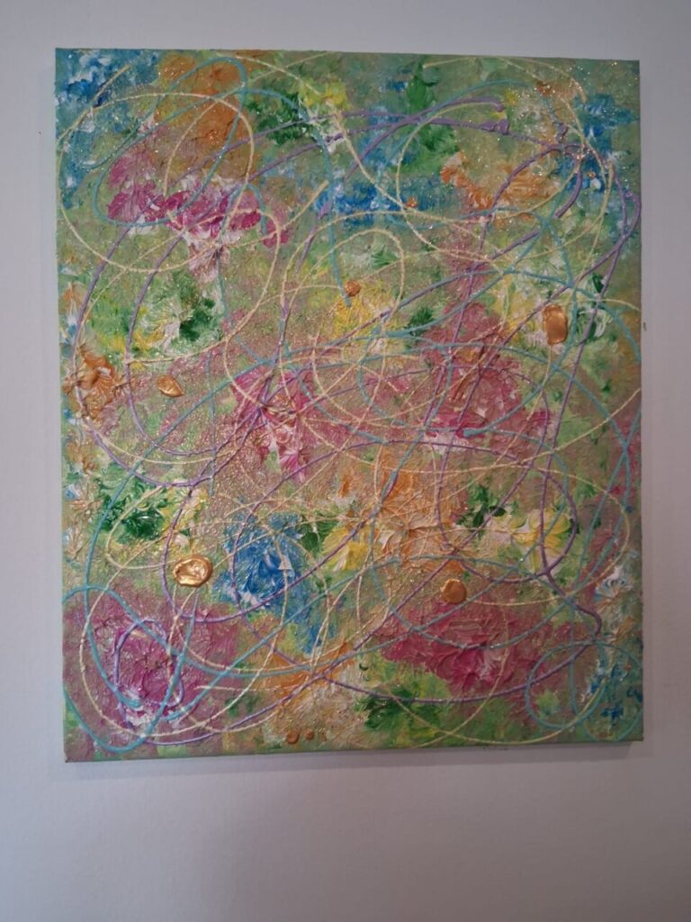 Pintura abstracta con colores vibrantes y texturas diversas