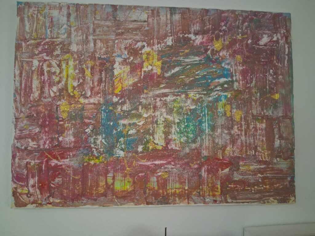 Pintura abstracta con colores vibrantes y texturas variadas