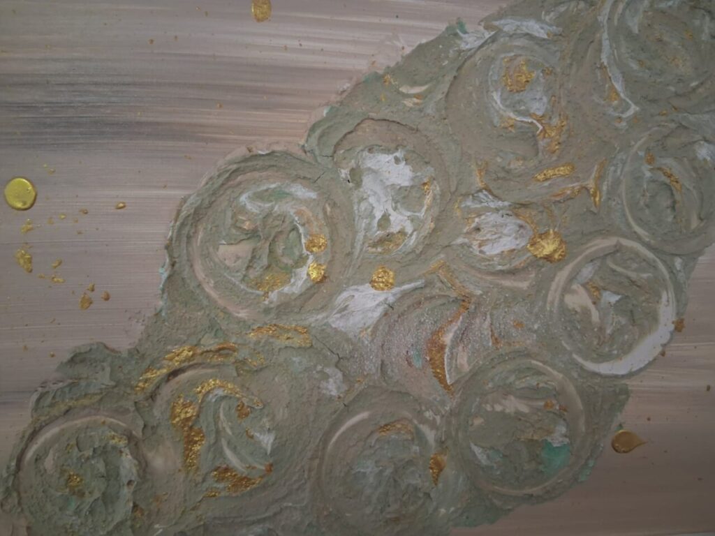 Textura art&iacute;stica con detalles dorados y formas circulares en relieve