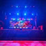 Escenario iluminado para el evento The After Party en Es Gremi