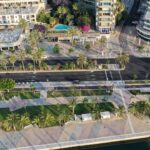 Vista aérea del Paseo Marítimo de Palma con áreas verdes y edificios modernos.