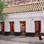 Fachada de la tienda Camper en Nueva York con diseño moderno.